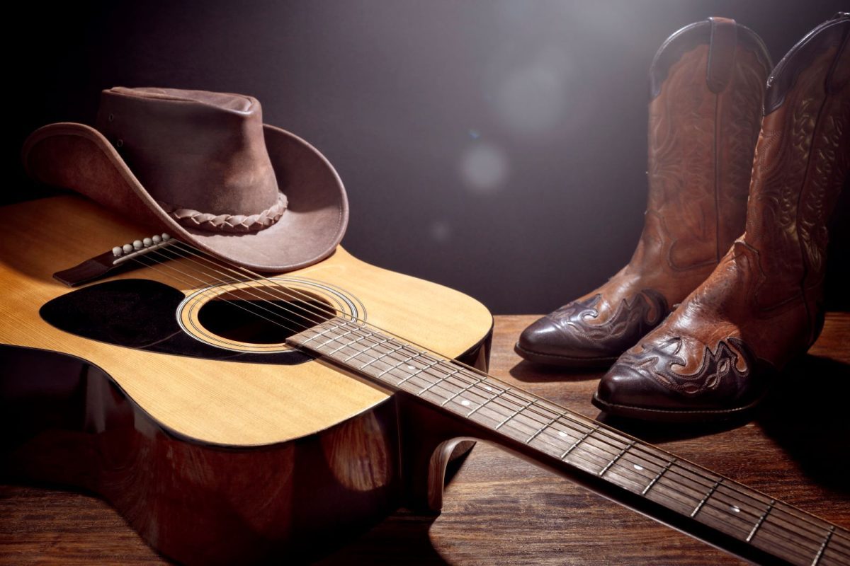 guitar, cowboy boots, and cowboy hat